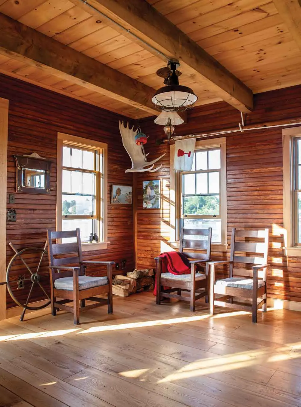 Zuke raided his stash of oil lanterns and hung a dozen of them from the home's beams