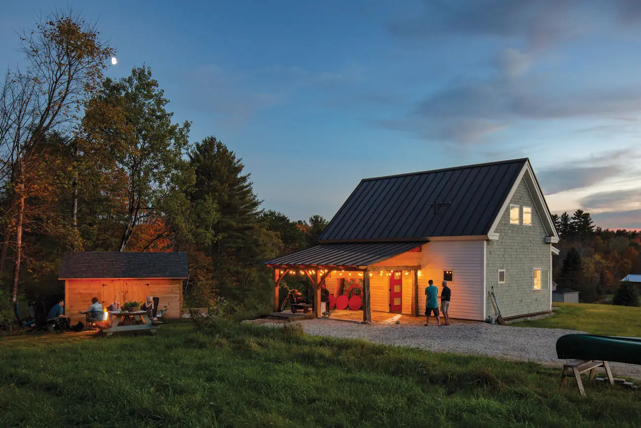 The cherry-red door on Carol Bass and Bob Newton’s Pownal home — equipped with a bronze-colored metal roof and granite patio — hints at the boisterous palette inside.
