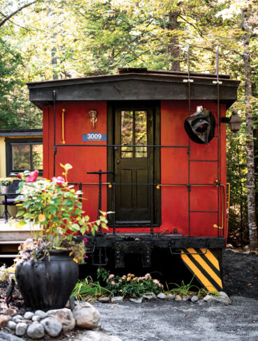 Carrabassett Valley’s Johanna Fowler painted her vintage Maine Central Railroad caboose Benjamin Moore’s Heritage Red as a classic alternative to the car’s original yellow.
