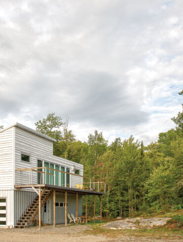 Jen Sansosti and Steve White’s modified container home perches in a two-acre clearing overlooking a pond on a 63-acre Brooklin plot.