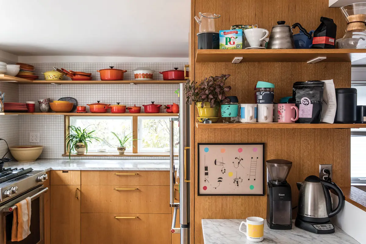 Realistic portrayals of professionally designed kitchens — with, say, mismatched mugs, food packages, or refrigerator art on display — are healthier for consumers, Portland designer Catherine Weiland says.