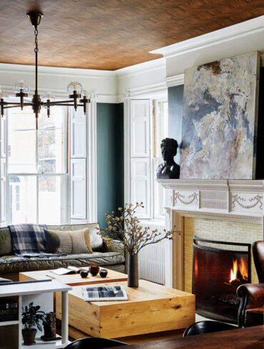 A vintage landscape from Portland Flea-For-All sparked the barroom’s palette at the Blind Tiger, in Portland, Maine