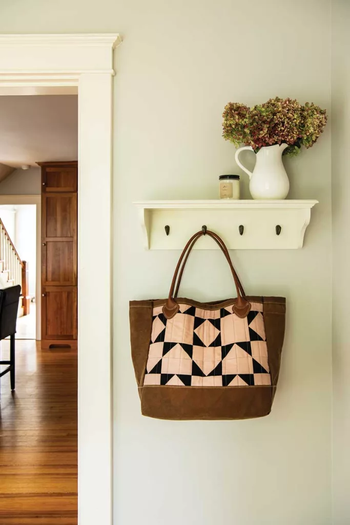 a quilted tote brightens the entry. 