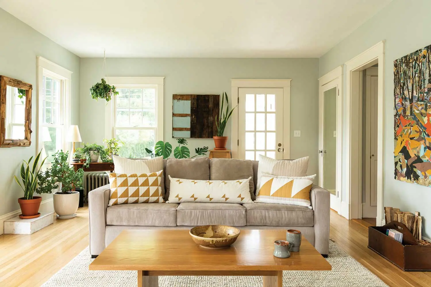 A mix of pillows with quilted covers punches up the living-room sofa.