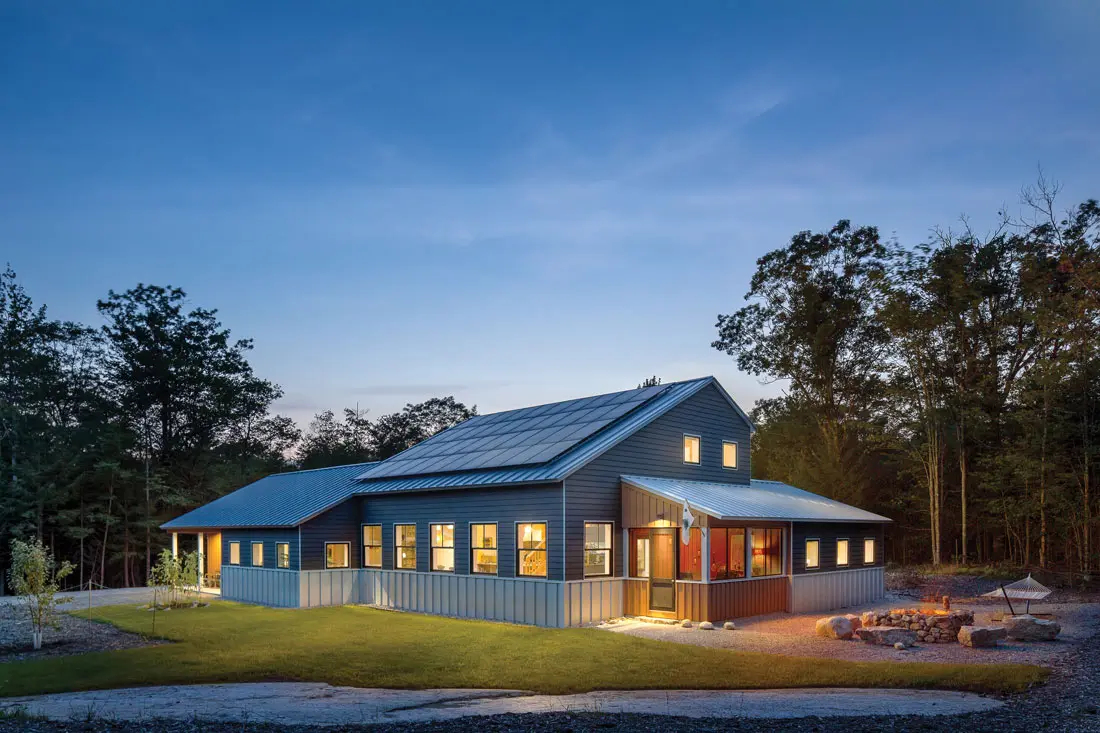 Michael Rego and James Sabatino’s Freeport Saltbox is ringed by forest so thick the other homes in their subdivision aren’t visible.