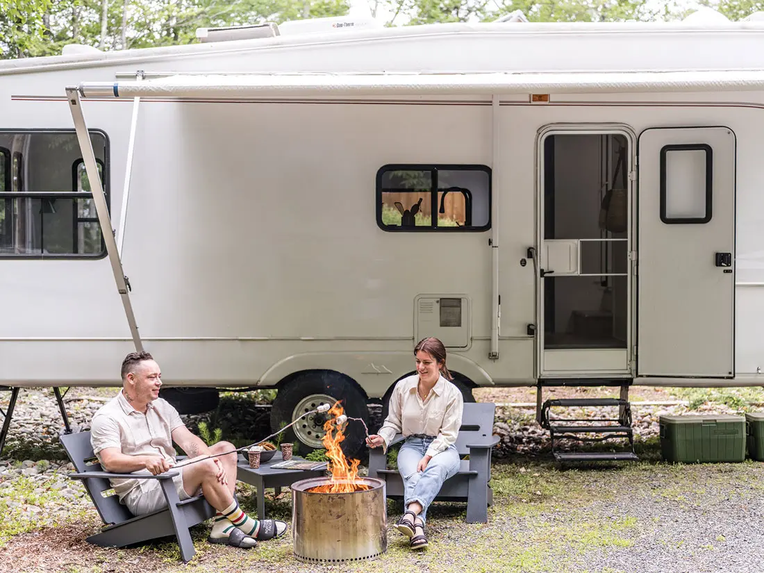 Meredith Brockington and Joe Graffius with their 2003 Montana Keystone fifth-wheel RV.