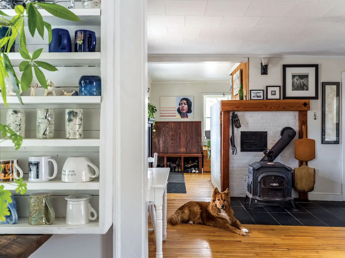 The kitchen brims with nostalgic details, like an iron beehive oven bearing the name of a Portland foundry that burned down in 1866 and mini built-ins lined with dozens of mugs, many by family members and friends.