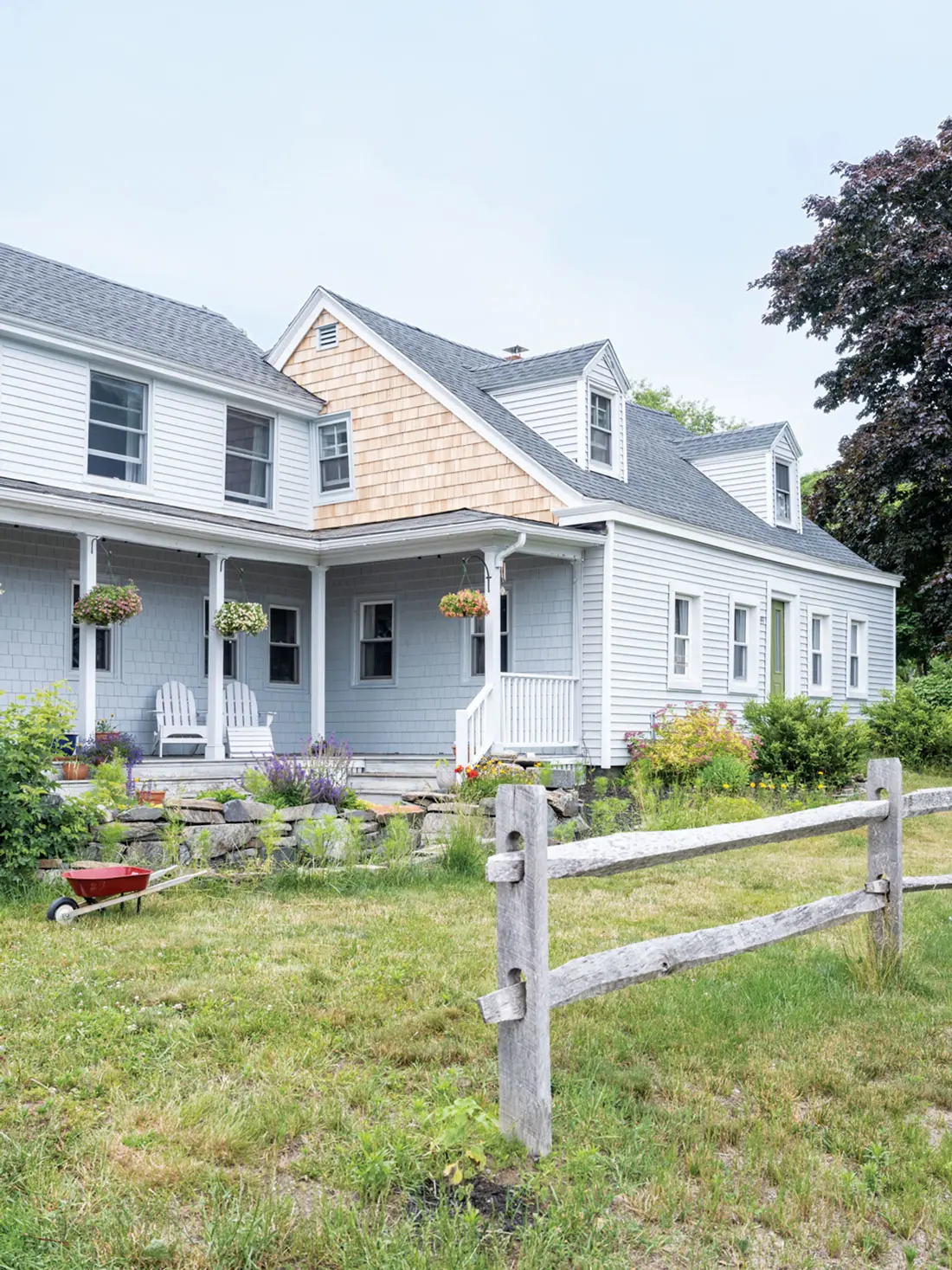 This summer, the couple took turns on a ladder, installing new cedar shingles and clapboards on their 18th-century Cape and painting them a custom color that “looks like foggy, salty air, ” Watka says.