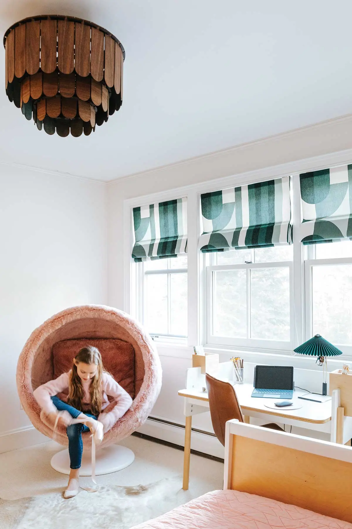 Bold wallpaper sets the tone in Coco (left) and Poppy’s Freeport bedrooms