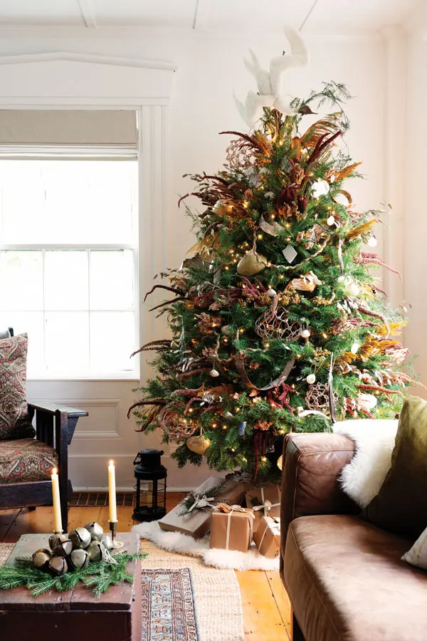 Christmas tree decorated with dried maroon amaranth, pink celosia, and yellow tansy