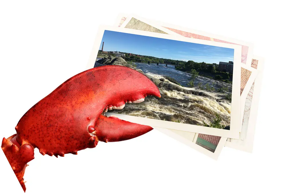 Lobster claw with a stack of pictures of the Androscoggin River