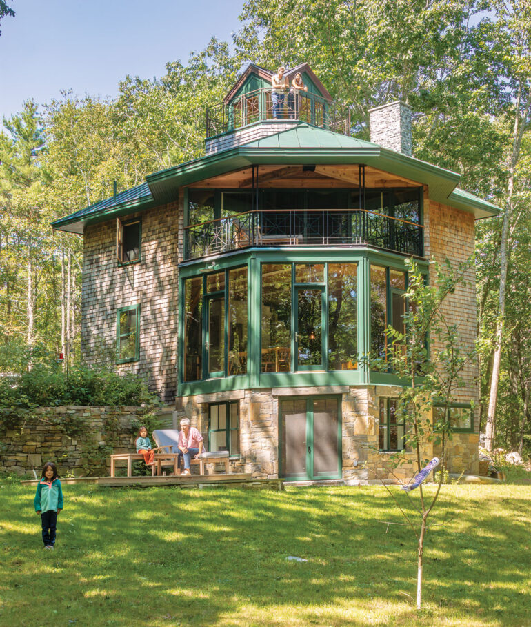 the three-sided, glass-walled bump-out of jeweler Aaron Ruff’s multifaceted Arrowsic home