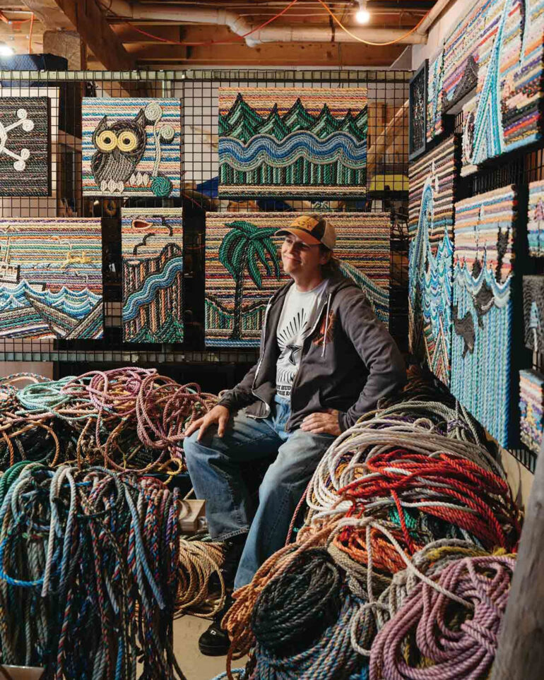 Eric Darling with his rope art and piles of old lobster-trap rope at his Appleton, Maine, studio