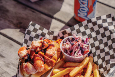 a Shannon's Unshelled lobster roll topped with Moxie glaze