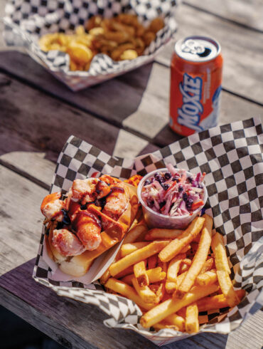 a Shannon's Unshelled lobster roll topped with Moxie glaze