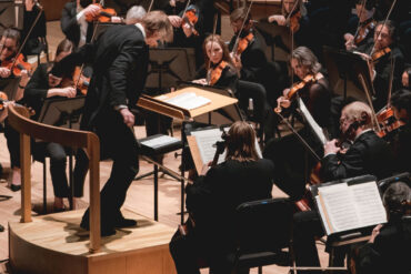 Eckart Preu directing the Portland Symphony Orchestra