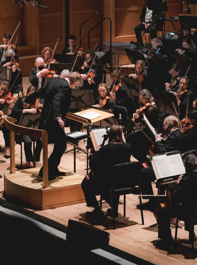 Eckart Preu directing the Portland Symphony Orchestra