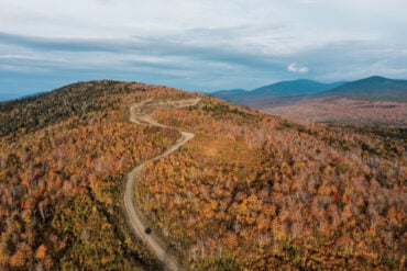 The drive up Quill Hill, located between the towns of Rangeley and Stratton Maine, during peak foliage