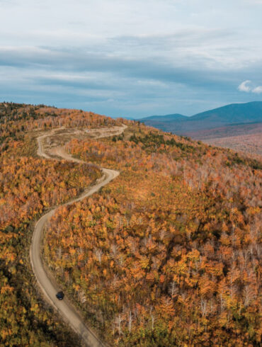 The drive up Quill Hill, located between the towns of Rangeley and Stratton Maine, during peak foliage