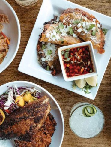 Drunken noodles with shrimp and crispy pork belly; guajillo-braised-brisket tacos; Cajun grilled shrimp with garlic-cheddar grits; Caribbean seared red snapper with sweet-potato latkes from The Butcher The Baker in Bangor, Maine