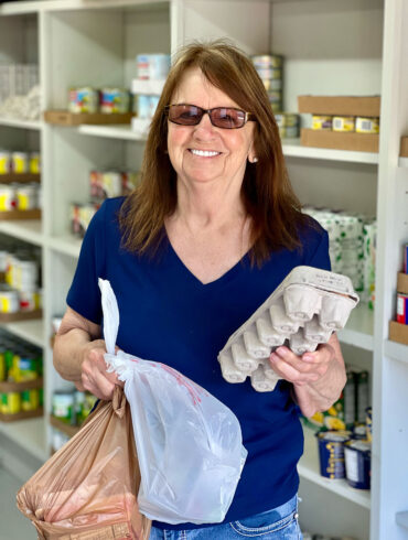 woman shopping at a food pantry