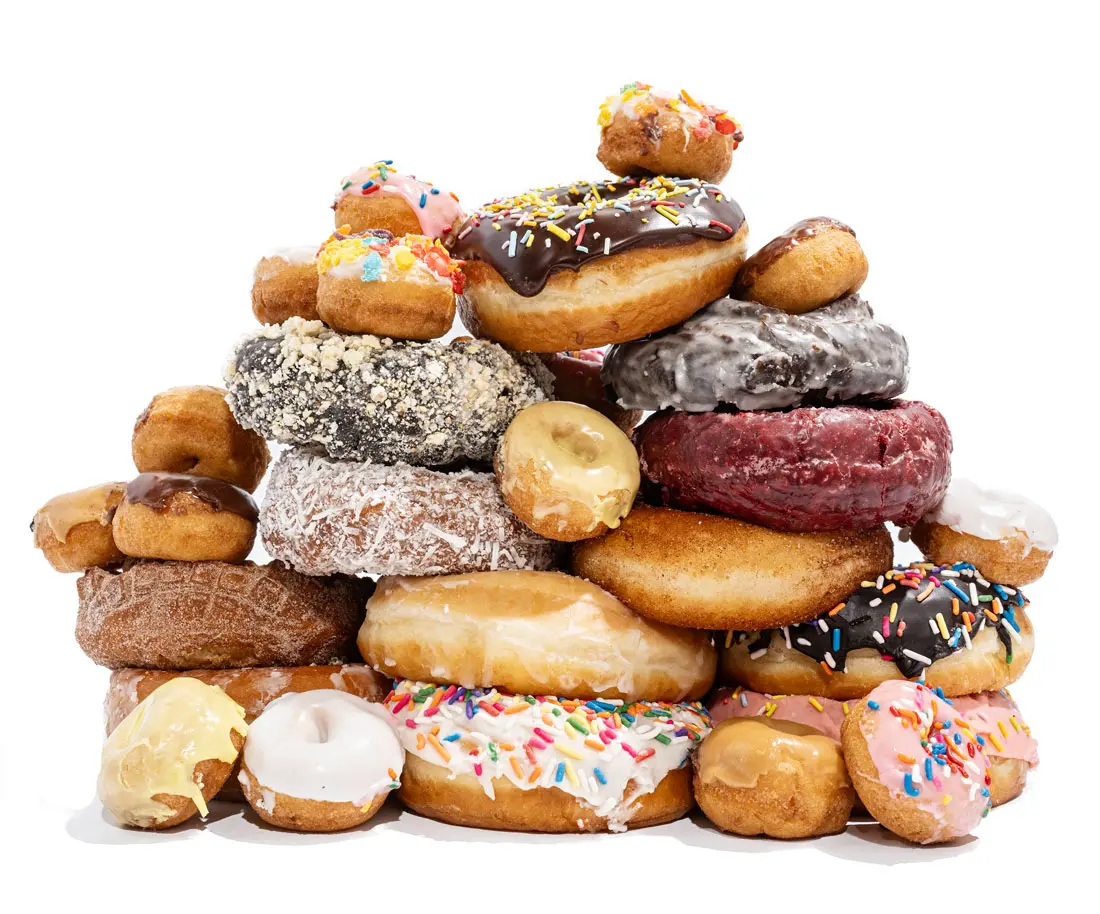 doughnuts from The Cookie Jar, Ruckus, Eighty 8, and Lovebirds in a heap 