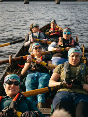 women rowing a Cornish pilot gig in Belfast Maine