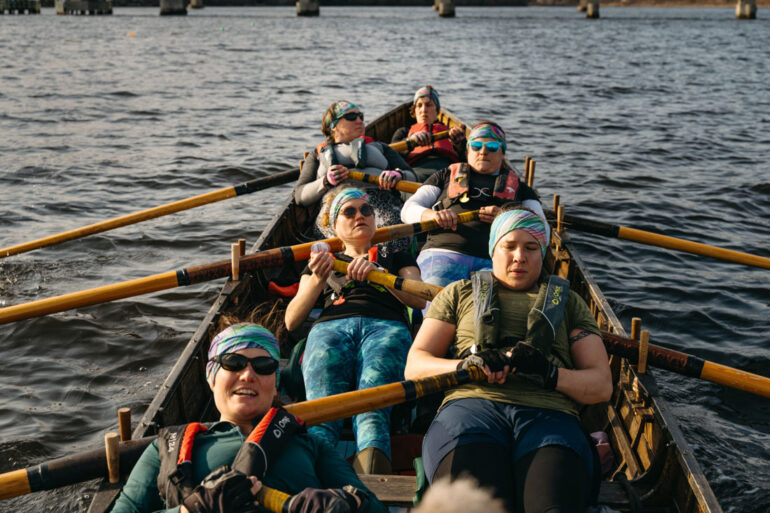 women rowing a Cornish pilot gig in Belfast Maine