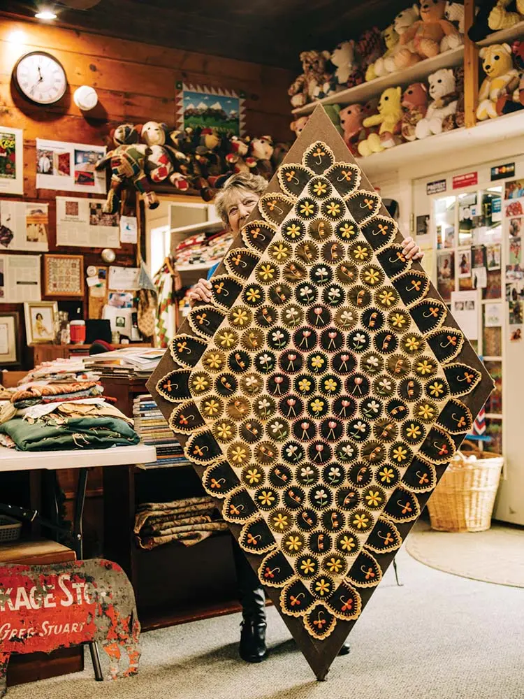 Betsey Telford-Goodwin a diamond shaped quilt at Rocky Mountain Quilt