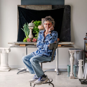 Lynn Karlin posing for a photo in her Belfast Maine studio