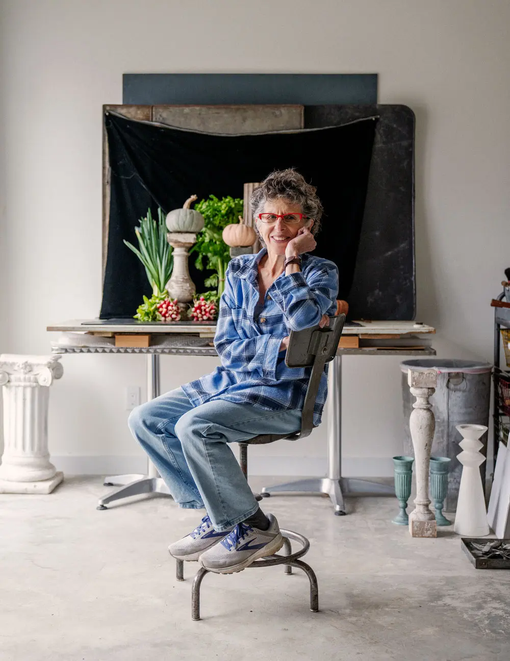 Lynn Karlin posing for a photo in her Belfast Maine studio