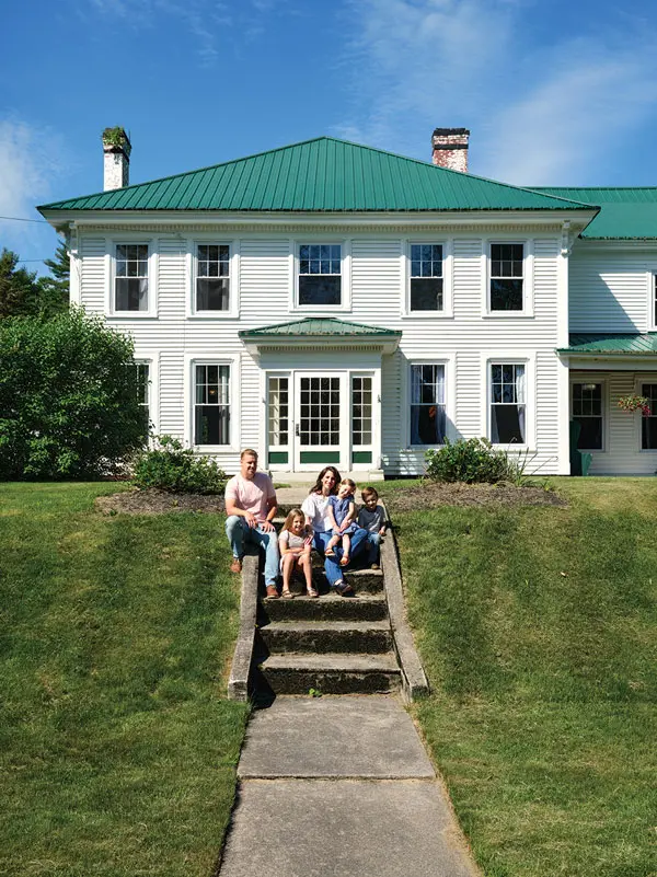The Drew family outside the 1870 Greenwood Villa built by Philander Tolman. It is now known as the Greenwood Manor Inn