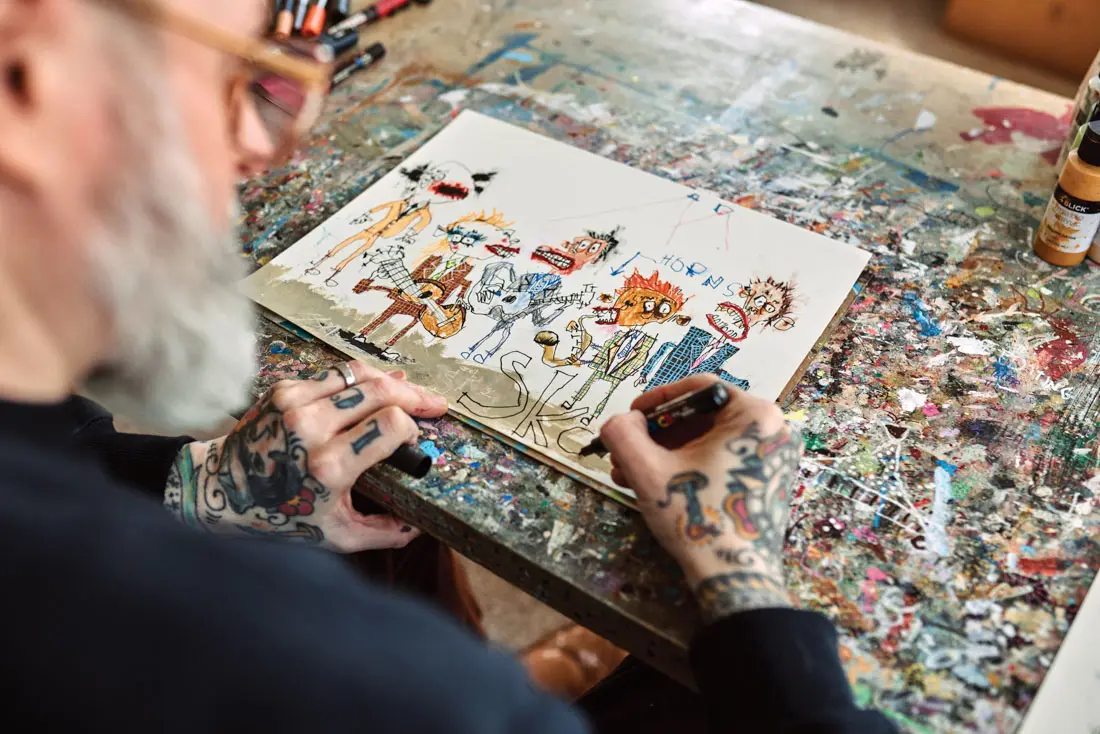 Lewis Rossignol working on an illustration at his Portland studio
