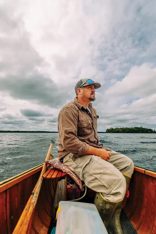 Nate Bacon, in the stern of one of his Grand Laker canoes.