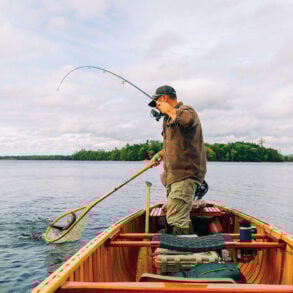Nate Bacon fishing in his Grand Laker Canoe