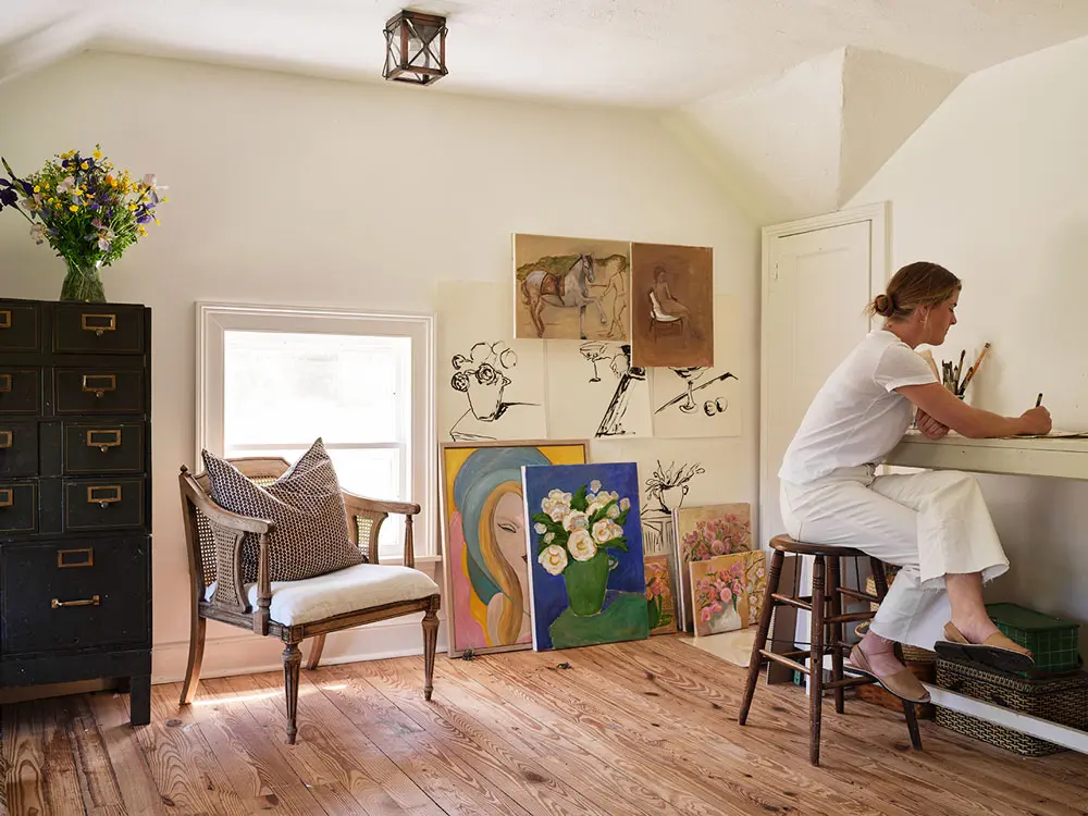 Clementine Cavanagh sits in the studio of her renovated circa 1790 Federal in Phippsburg Maine