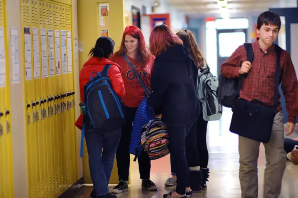 Maine School of Science and Mathematics students chatting in the hallway