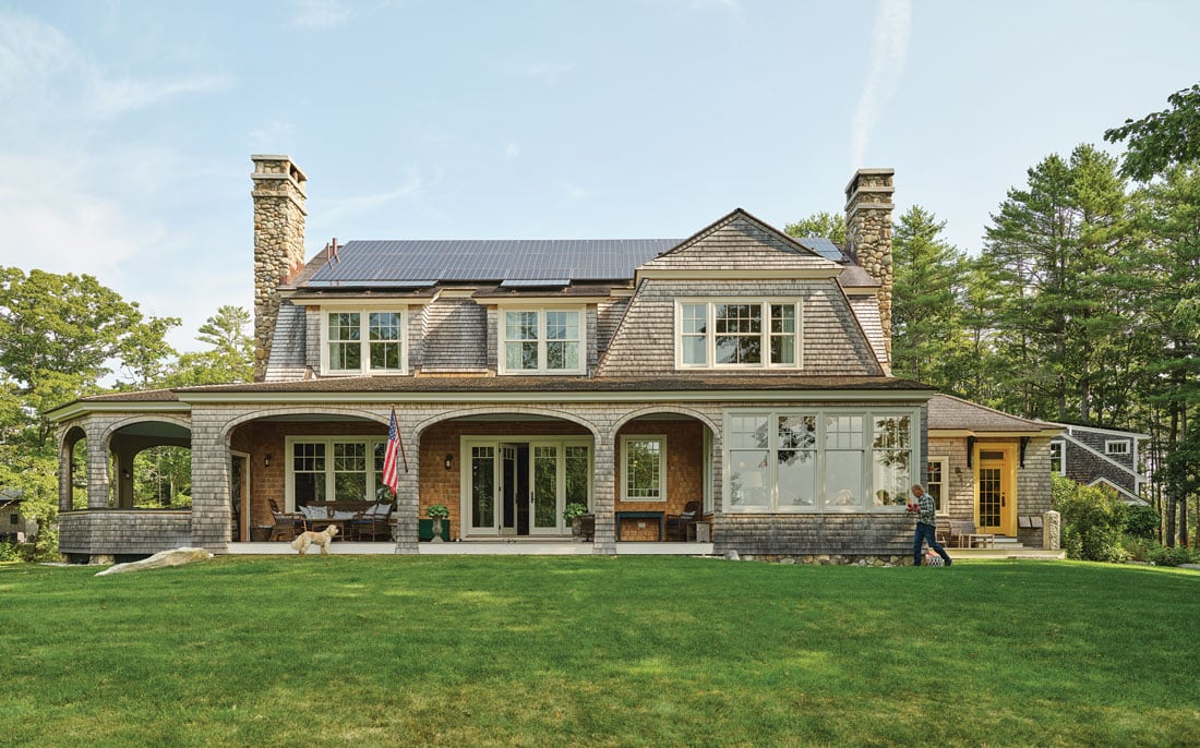 The exterior of Ford and Karen Reiche’s waterfront home, in Freeport, riffs on an 1899 Shingle-style Islesboro cottage designed by famed architect Fred Savage