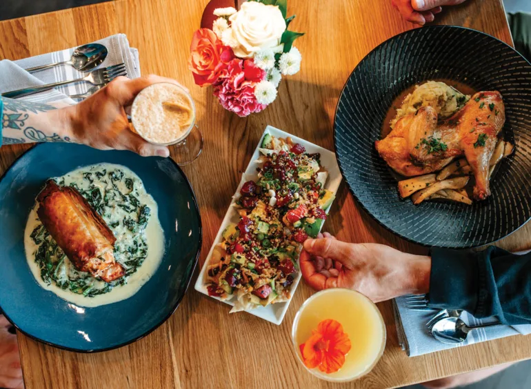 The salmon spanakopita, poke nachos, and roasted half chicken from Yolked Farm to Table in Windham, Maine