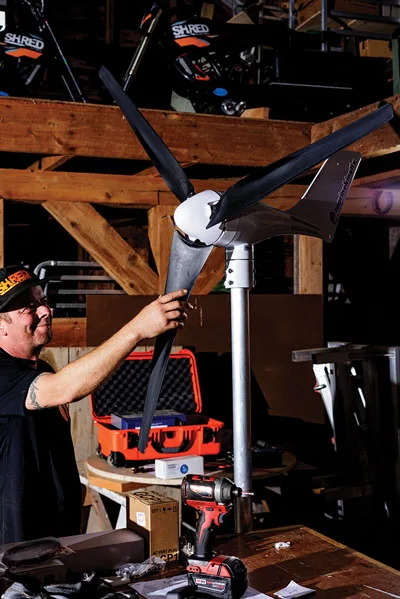 Nick Planson of Shred Electric with a small wind turbine