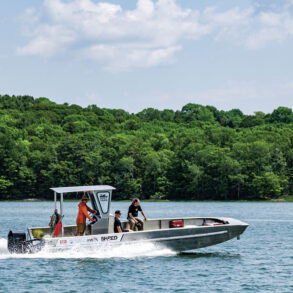 An electric-powered boat from the Boat Yard, in Yarmouth, makes a service call to work on electric-powered machinery at Blackstone Point Oysters, on the Damariscotta River.