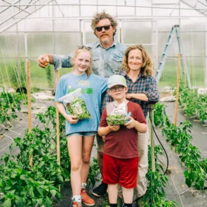 Husband-and-wife team Brendan McQuillen and Brady Hatch grow their MOFGA-certified microgreens in the Morning Dew Seedling + Supply greenhouses located across from their farm.