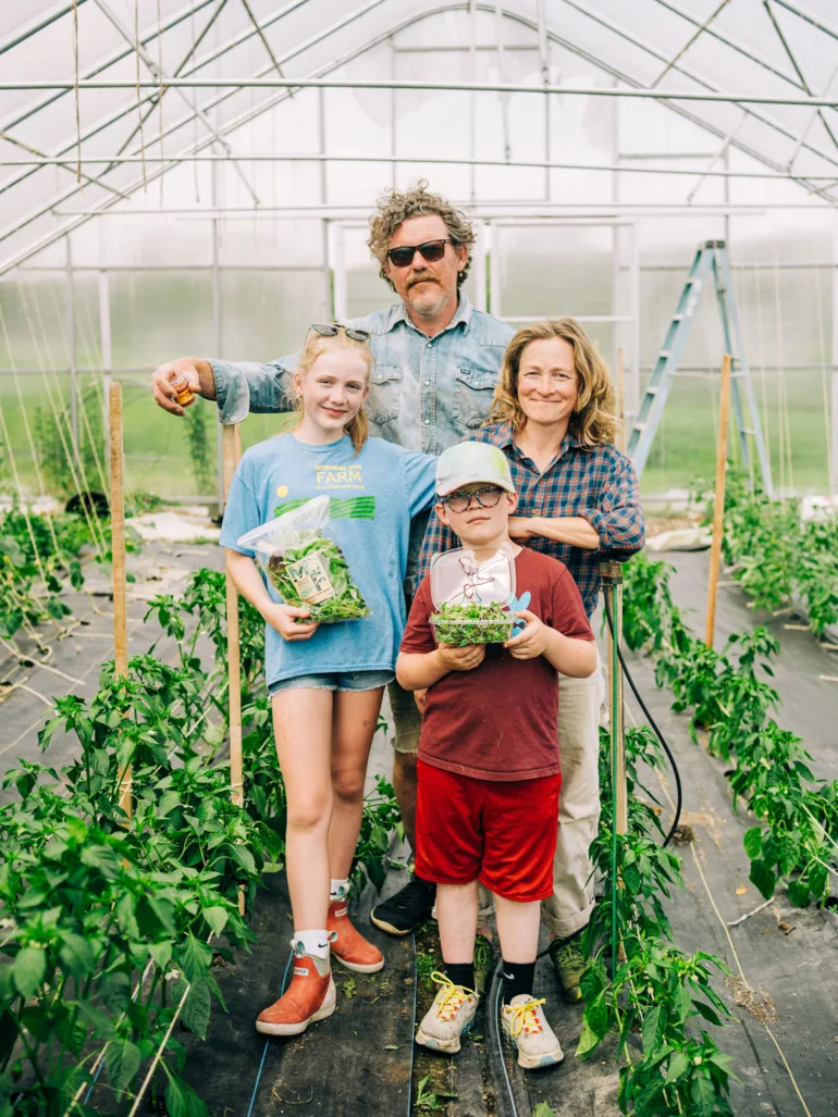 Husband-and-wife team Brendan McQuillen and Brady Hatch grow their MOFGA-certified microgreens in the Morning Dew Seedling + Supply greenhouses located across from their farm.
