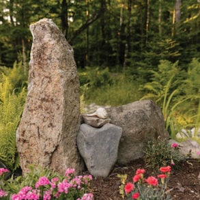 a heart-shaped stone at the center of one of Rick Cochran's rock gardens