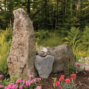 a heart-shaped stone at the center of one of Rick Cochran's rock gardens