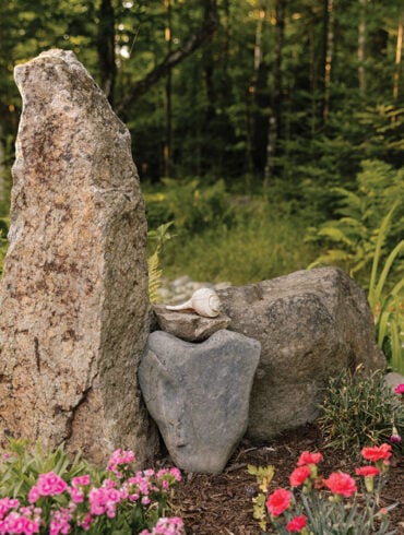 a heart-shaped stone at the center of one of Rick Cochran's rock gardens