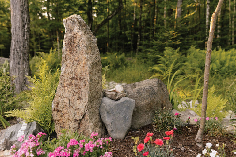 a heart-shaped stone at the center of one of Rick Cochran's rock gardens
