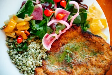 Pork Milanese and pasta Aglio e Olio at the Watershed Wood-Fired Kitchen in Bethel, Maine