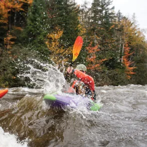 whitewater kayaker on the Dead River in Maine
